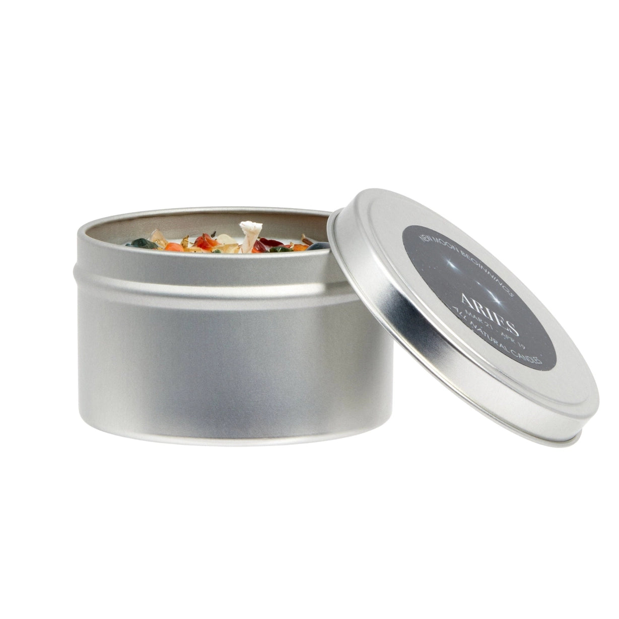 Silver candle tin with lid open on a white background