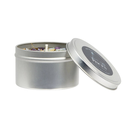 Silver candle tin with lid open on a white background